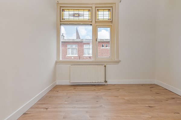 Medium property photo - Johan Gramstraat 48, 2522 XA Den Haag